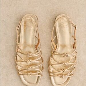 Gold open-toe Sezane sandals with a flat sole and intricate woven design;Size 38